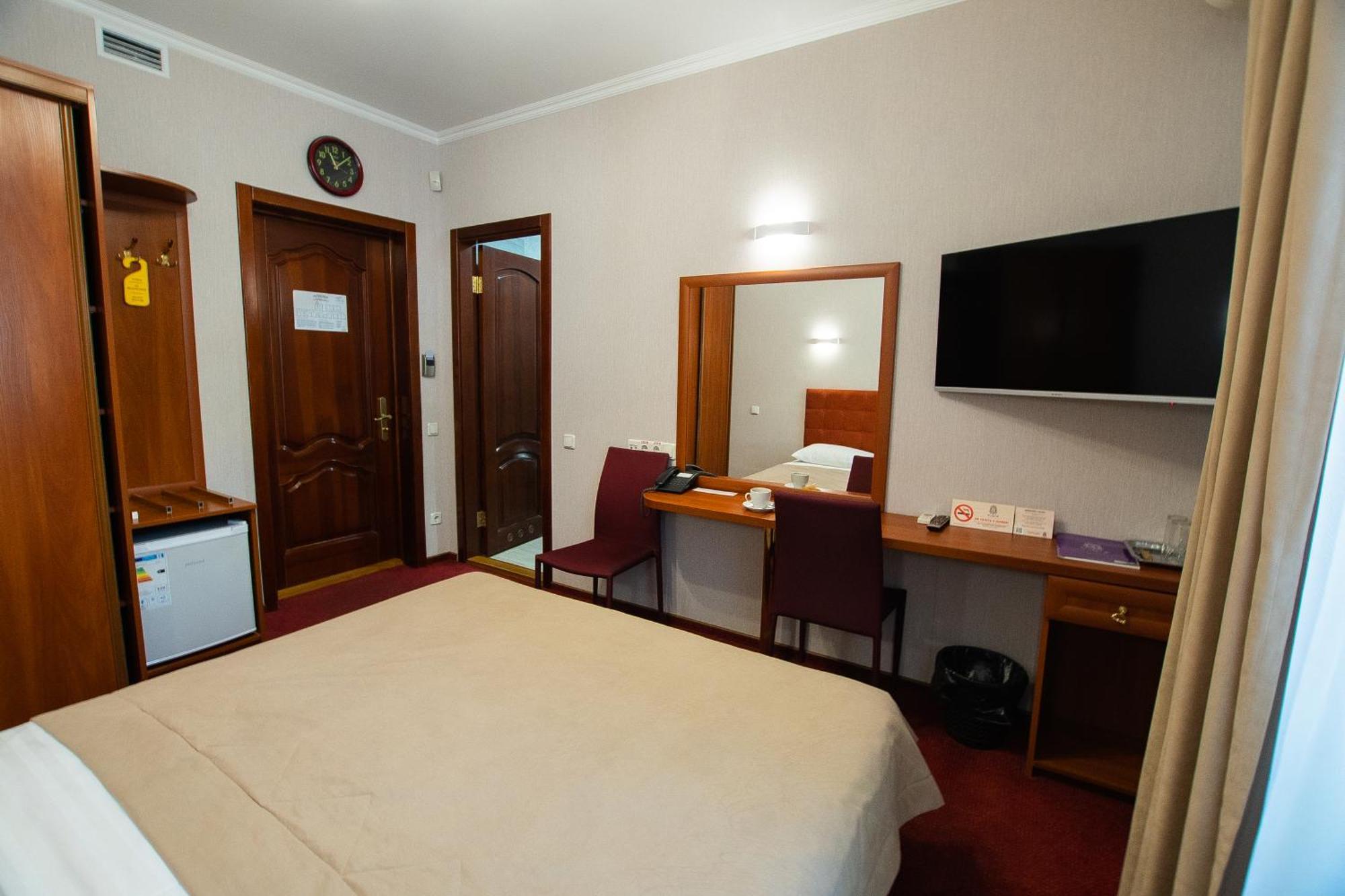 Grand Christer Hotel Kiev Værelse billede